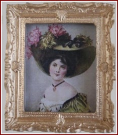P 015 A Gold Framed Picture of a Lady in a Large Hat
